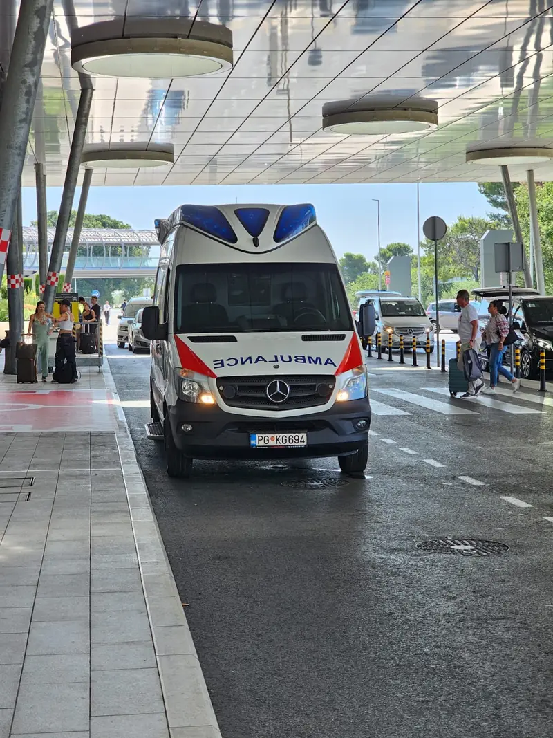 Airport pickup under the terminal canopy