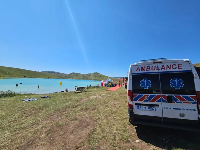 Medical standby at a lakeside sports event